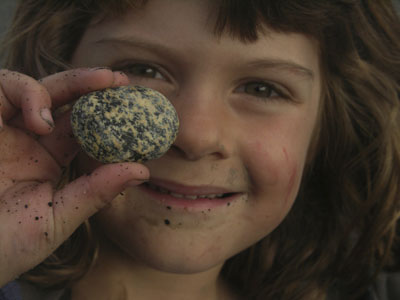 Child with a Rock Before